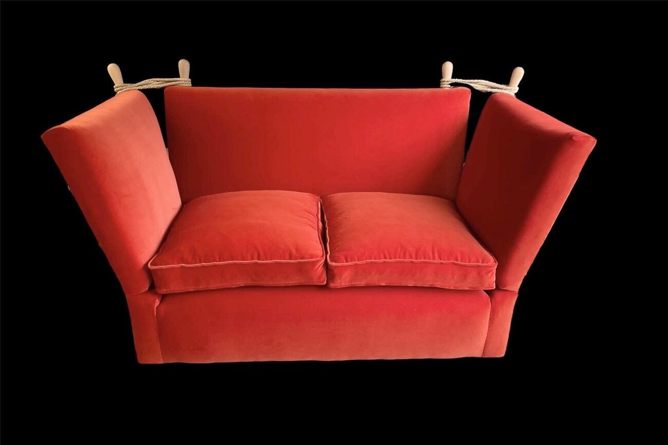 Knole sofa in coral velvet with corded rope ties